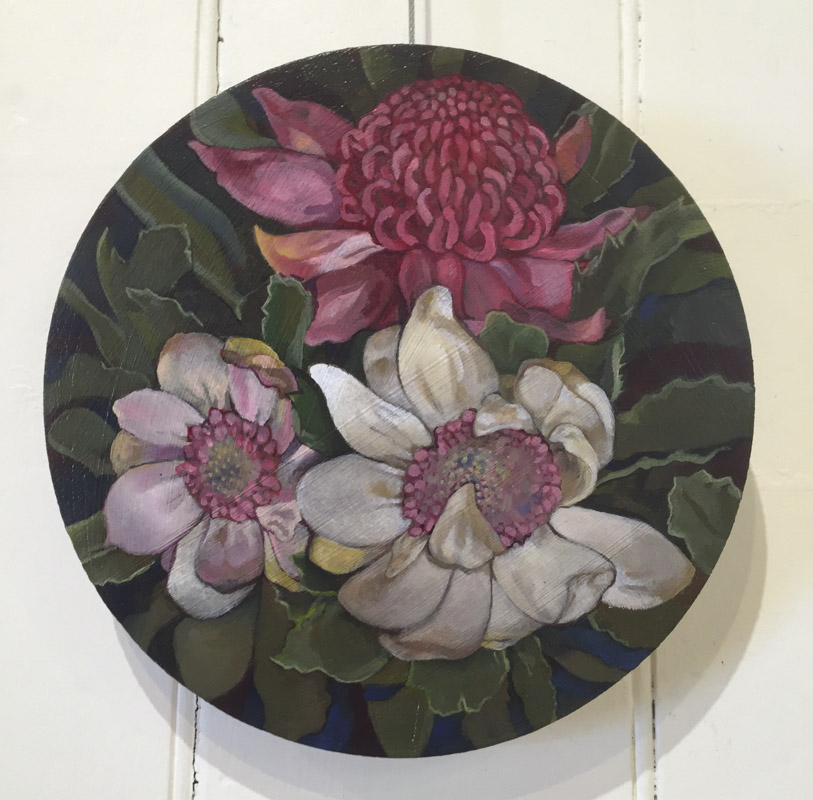 Oil painting on a circular board depicting Waratah flowers.